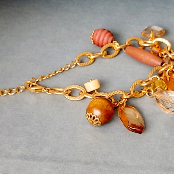 Gold Bracelet With Wooden Charms - Picture 3 of 4